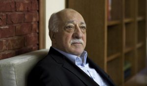 FILE - In this March 15, 2014 file photo, Turkish Islamic preacher Fethullah Gulen is pictured at his residence in Saylorsburg, Pennsylvania, United States. Police conducted raids in a dozen Turkish cities Sunday, detaining at least 24 people — including journalists, TV producers and police — known to be close to a movement led by a U.S.-based moderate Islamic cleric who is a strong critic of President Recep Tayyip Erdogan. It was the latest crackdown on cleric Fethullah Gulen's movement, which the government has accused of orchestrating an alleged plot to try to bring it down. (AP Photo/Selahattin Sevi, File)