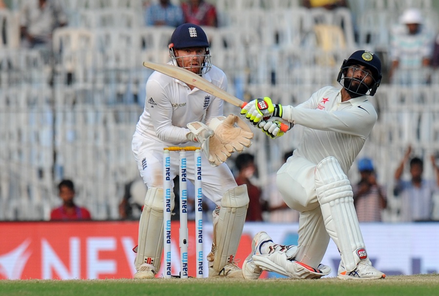 India's Ravindra Jadeja (R) plays a shot during the fourth day of the fifth and final Test cricket match between India and England at the M.A. Chidambaram Stadium in Chennai on December 19, 2016. / AFP PHOTO / ARUN SANKAR / ----IMAGE RESTRICTED TO EDITORIAL USE - STRICTLY NO COMMERCIAL USE----- / GETTYOUT