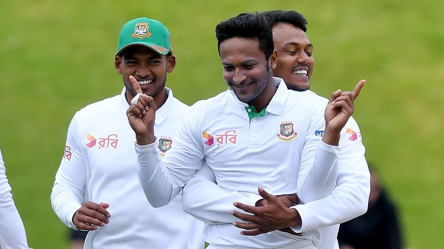 Bangladesh's Shakib Al Hasan (C) celebrates New Zealand's Tom Latham being caught with LBW with team mates Kamrul Islam Rabbi (R and Nazmul Hossain Shanto (L) during day four of the first international Test cricket match between New Zealand and Bangladesh at the Basin Reserve in Wellington on January 15, 2017. / AFP / Marty Melville (Photo credit should read MARTY MELVILLE/AFP/Getty Images)