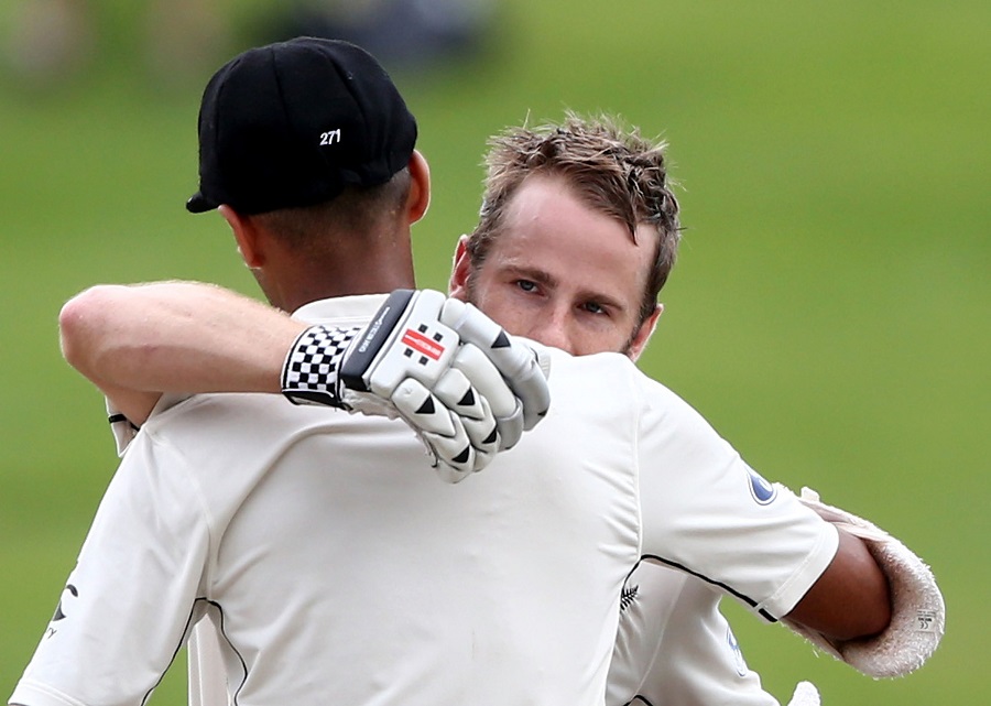 HAMILTON, NEW ZEALAND - MARCH 27:  Captain Kane Williamson is congratulated by Jeet Raval of New Zealand on scoring 100 runs during day three of the Test match between New Zealand and South Africa at Seddon Park on March 27, 2017 in Hamilton, New Zealand.  (Photo by Dave Rowland/Getty Images)