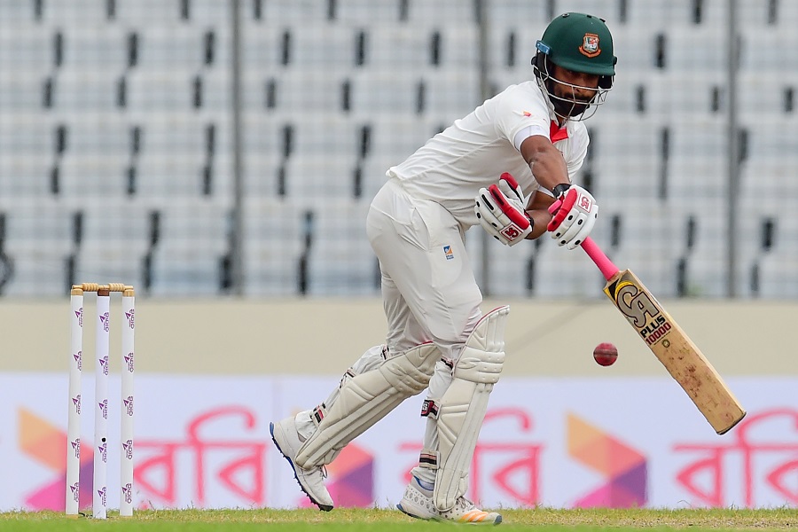 Bangladesh's Tamim Iqbal plays a shot during the third day of the first Test cricket match between Bangladesh and Australia at the Sher-e-Bangla National Cricket Stadium in Dhaka on August 29, 2017. / AFP PHOTO / Munir UZ ZAMAN