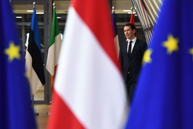 Austria's new Chancellor Sebastian Kurz arrives to meet the European Council president on December 19, 2017, at the European Council in Brussels. ?Austria's far-right was sworn in on December 18 as part of the new government, rounding off a triumphant year for Europe's nationalists. The coalition between the conservative People's Party (OeVP) and the FPOe has pledged to stop illegal immigration, cut taxes and resist EU centralisation, and will be led by Chancellor Sebastian Kurz of the OeVP, at 31 the world's youngest leader.  / AFP PHOTO / EMMANUEL DUNAND