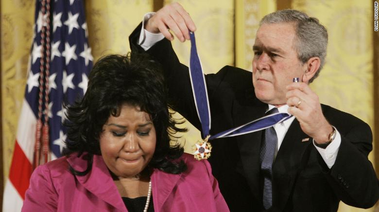 President Bush presents the Presidential Medal of Freedom, Wednesday, Nov. 9, 2005, to singer Aretha  Franklin in the East Room of the White House. The Presidential Medal of Freedom is the nation's highest civilian award, and recognizes exceptional meritorious service. (AP Photo/Evan Vucci)