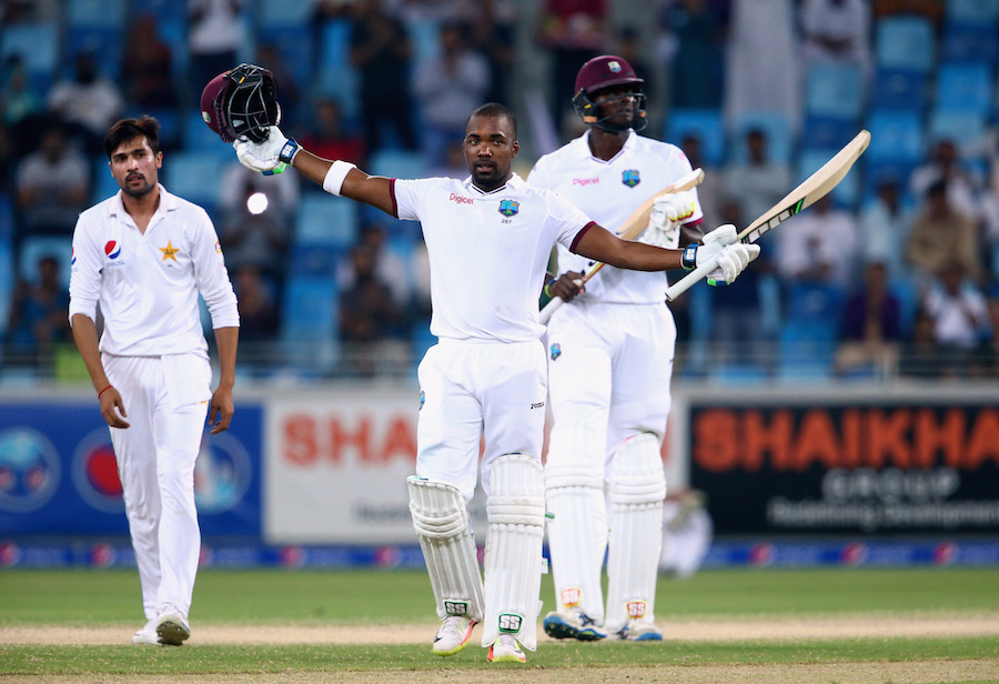 DUBAI, UNITED ARAB EMIRATES - OCTOBER 17:  Darren Bravo of West Indies celebrates reaching his century during Day Five of the First Test between Pakistan and West Indies at Dubai International Cricket Ground on October 17, 2016 in Dubai, United Arab Emirates.  (Photo by Francois Nel/Getty Images)