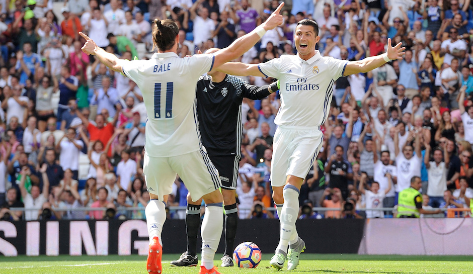 MADRID, SPAIN - SEPTEMBER 10:    Cristiano Ronaldo of Real Madrid celebrates with Gareth Bale after scoring opening goal during the La Liga match between Real Madrid CF and CA Osasuna at Estadio Santiago Bernabeu on September 10, 2016 in Madrid, Spain.  (Photo by Denis Doyle/Getty Images)