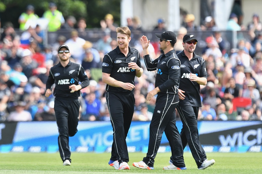 CHRISTCHURCH, NEW ZEALAND - DECEMBER 26: James Neesham of New Zealand is congratulated by team mates after dismissing Mahmudullah of Bangladesh during the first One Day International match between New Zealand and Bangladesh at Hagley Oval on December 26, 2016 in Christchurch, New Zealand. (Photo by Kai Schwoerer/Getty Images)