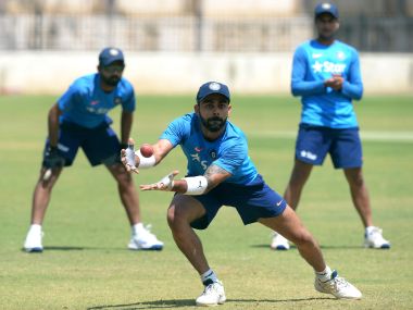Indian Test cricket captain Virat Kohli takes a catch during a practice session at The M. Chinnaswamy Stadium in Bangalore on March 1, 2017. India will play against Australia in their second Test match of a four match series beginning on March 4.  / GETTYOUT / ----IMAGE RESTRICTED TO EDITORIAL USE - STRICTLY NO COMMERCIAL USE-----  / AFP PHOTO / Manjunath KIRAN / ----IMAGE RESTRICTED TO EDITORIAL USE - STRICTLY NO COMMERCIAL USE----- / GETTYOUT
