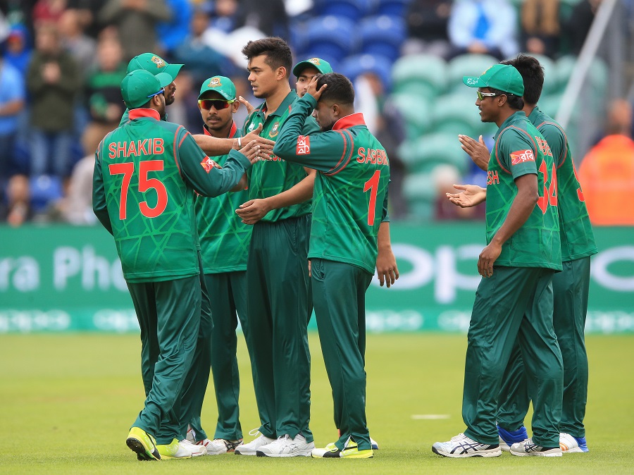 Bangladesh's Taskin Ahmed (centre) celebrates after taking the wicket of New Zealand's Luke Ronchi during the ICC Champions Trophy, Group A match at Sophia Gardens, Cardiff. (Photo by Nigel French/PA Images via Getty Images)