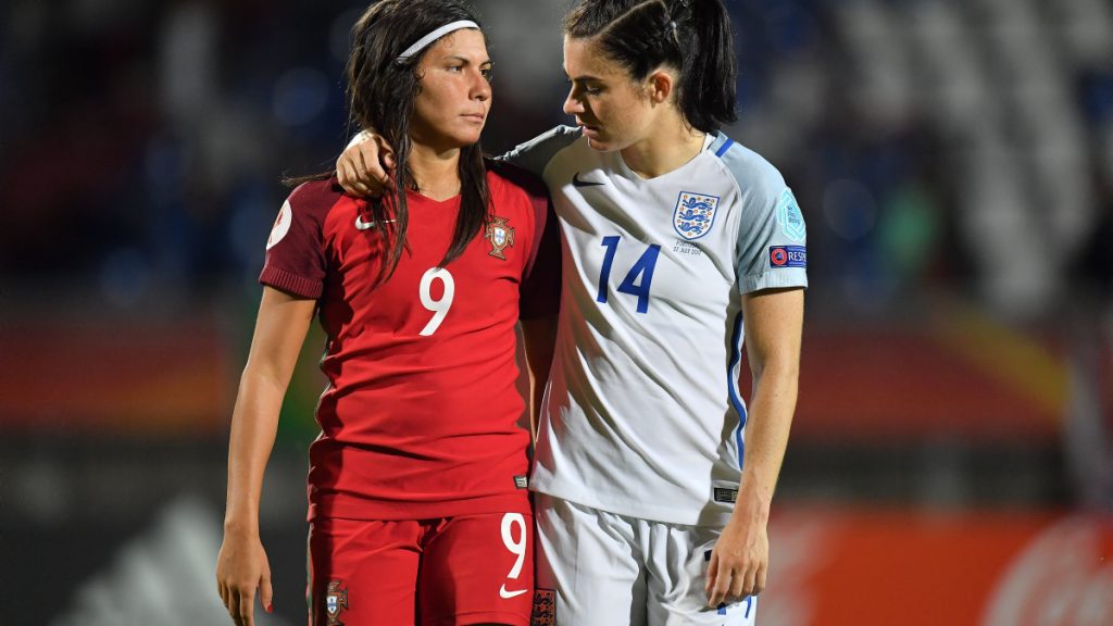 Ana Borges of Portugal and Karen Carney of England share a hug at the final whistle at the UEFA Women's EURO 2017 Group D match between Portugal and England